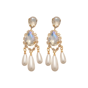 Vintage gold plated earrings with colorful crystals and teardrop pearls on white background