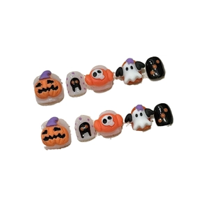 3D Halloween press-on nails for kids featuring pumpkins, ghosts, and spooky cartoon patterns
