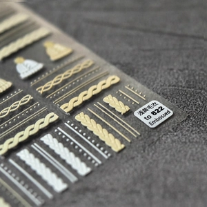 5D embossed nail art stickers with light yellow knit sweater patterns and 3D textures