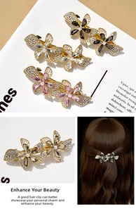Detail of floral spring hair clips with crystals, rhinestones and pearls on gold metal
