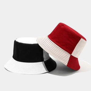 Two-tone cotton bucket hats for men and women in black, white, and red color blocking