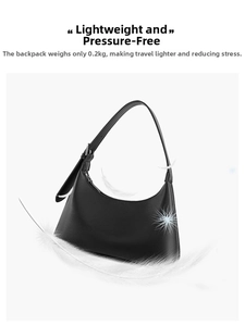 Lightweight black crescent shoulder bag in sleek leather, weighing only 0.2kg