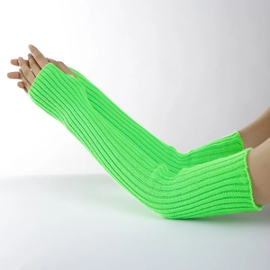 Close-up of neon green ribbed knit long arm warmers showing texture and elasticity