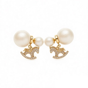Elegant gold rocking horse earrings with pearls and zircon crystals for women