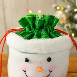 Detail of plush snowman Christmas gift bag with green glitter trim and red drawstring
