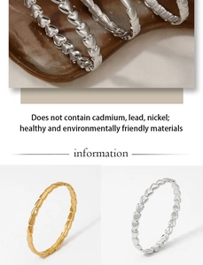 Detailed view of lead-free heart rings in gold and silver showing premium metal texture