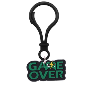 Detail of PVC Game Over keychain with gaming controller icon and black hook attachment