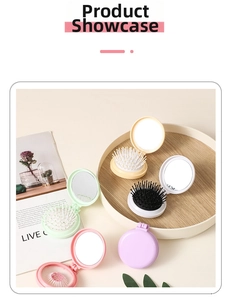 Detailed view of colorful folding travel hair brushes with mirrors in various candy tones