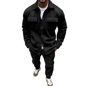 Detail of premium black faux suede fabric texture on men's jacket and jogger set