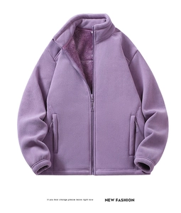 Detail of deep purple polar fleece jacket showing thick plush lining and high stand collar