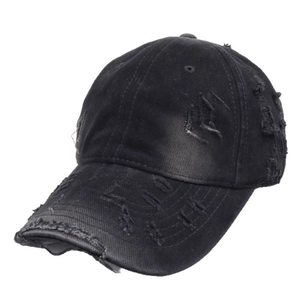 Retro distressed black cotton baseball cap with vintage frayed holes and street style