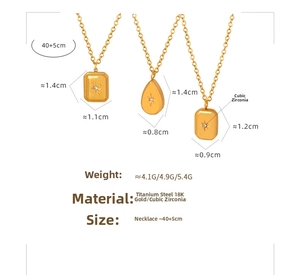 Detail showing vintage 18K gold plated titanium necklaces with cubic zirconia pendants