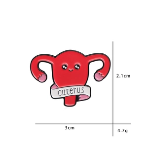 Cartoon enamel uterus brooch with smiling face and Cuterus text ribbon badge