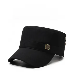 Detail of black cotton military cap featuring metal eyelets and a textured square plaque
