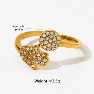 Detailed macro view of the gold-plated Hamsa Hand ring with white zircon inlays