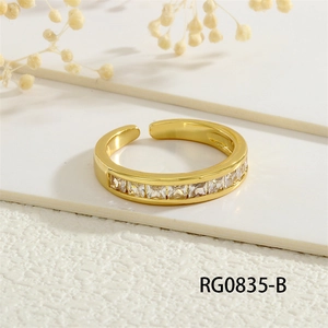 Macro shot of adjustable 18K gold plated ring with square cubic zirconia inlay