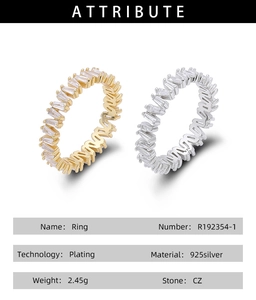 Detail view of 925 silver V-shaped rings in gold and silver finish with CZ stones