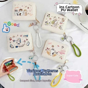 Close-up of cute cartoon cat PU leather wallet showing multiple card slots and wrist strap