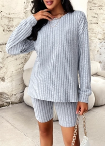 Detail view of women's gray ribbed knit long sleeve top and matching shorts lounge set
