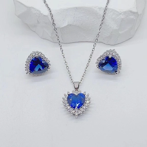 Blue heart necklace and earrings set with micro-paved cubic zirconia in silver finish