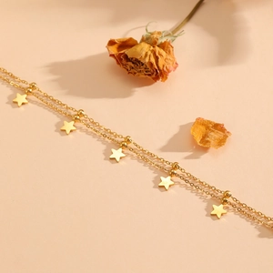 Zweilagiges goldenes Edelstahl-Sternarmband mit eleganten Sternanhängern für Damen