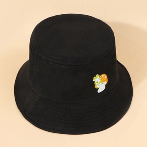 Detail view of the embroidered frog playing guitar on mushroom on black bucket hat