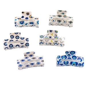Set of 6 Evil Eye PVC hair claws with blue and white patterns for daily hair styling