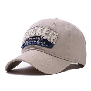 Casquette trucker beige vintage avec broderies et visière courbée en coton délavé