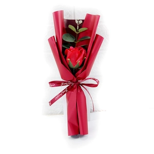 Single red soap rose bouquet with eucalyptus and Just For You ribbon on white background