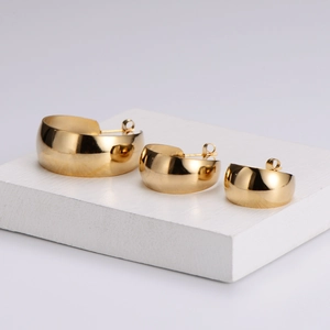 Polished 18k gold plated stainless steel C-shaped hoop earrings in three various sizes