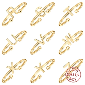 Detailed grid of S925 sterling silver open rings featuring letters R to Z in gold finish
