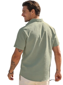 Detail view of the back profile and breathable linen texture of light green men's shirt