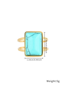 Detailed view of turquoise gold ring showing stone dimensions 1.55cm by 1.14cm and 5g weight