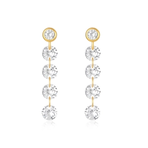 Detail view of long tassel earrings in gold-plated silver with sparkling cubic zirconia stones