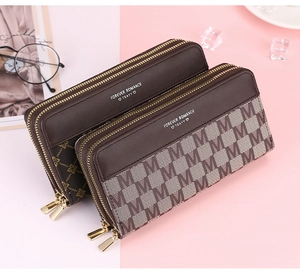 Detailed view of dual-zipper large capacity long wallets in brown and beige patterns