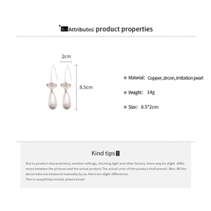 Détails des boucles d'oreilles fleur en zircone et perle avec dimensions précises