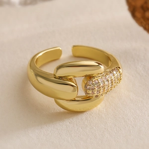 Macro shot of 18K gold plated chain ring featuring a micro-pave zircon buckle detail