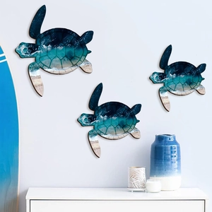 Set decorativo da parete in legno con tre tartarughe marine e motivi onde oceaniche