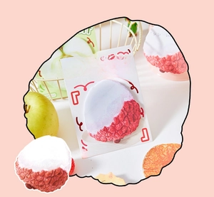 Detail of lychee shaped sticky notes with realistic fruit texture from the fruit basket series