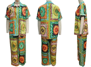 Three views of a sunflower print lounge set with short sleeve shirt and wide-leg pants