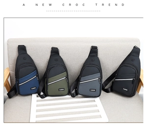 Detail of four multi-colored nylon sling bags with dual zippers and headphone port