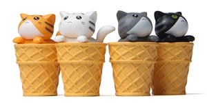 Set of four colorful cat figurines sitting in waffle cones for garden landscape decor