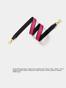 Detail of red and black woven bag strap with golden lobster clasps and 2.5cm width