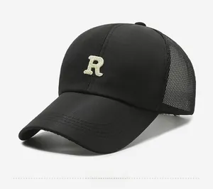 Close-up of black breathable mesh panel and R embroidery on quick-dry baseball cap