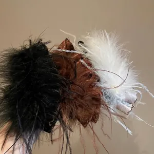 Chic acrylic feather tassel hair clips in black, brown and cream colors for women