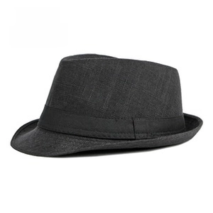 Close-up of deep grey textured wool fedora hat with a black decorative ribbon band