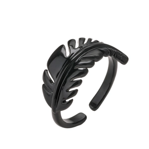 Detail of a black leaf-shaped open ring featuring a smooth polished enamel finish