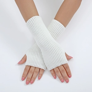 Close-up of white ribbed knit fingerless gloves showing professional texture and weave