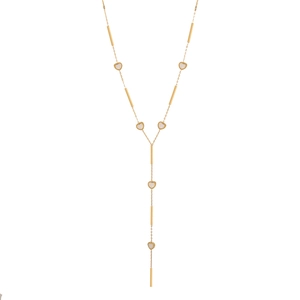 Long Y-shaped stainless steel necklace featuring gold chain and white heart pendant