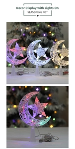 Detail of LED star and moon tree topper with USB battery box and crystalline texture